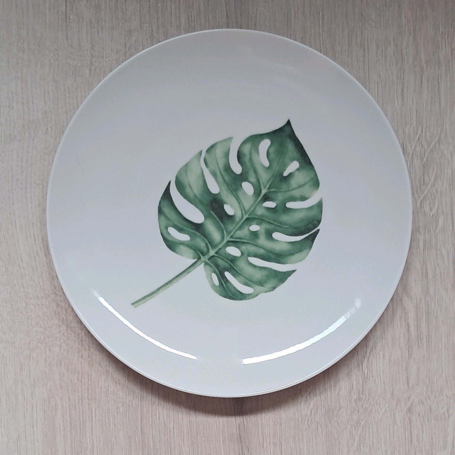 Wandbord met Monstera blad, Antiek en Kunst, Antiek | Wandborden en Tegels, Ophalen of Verzenden