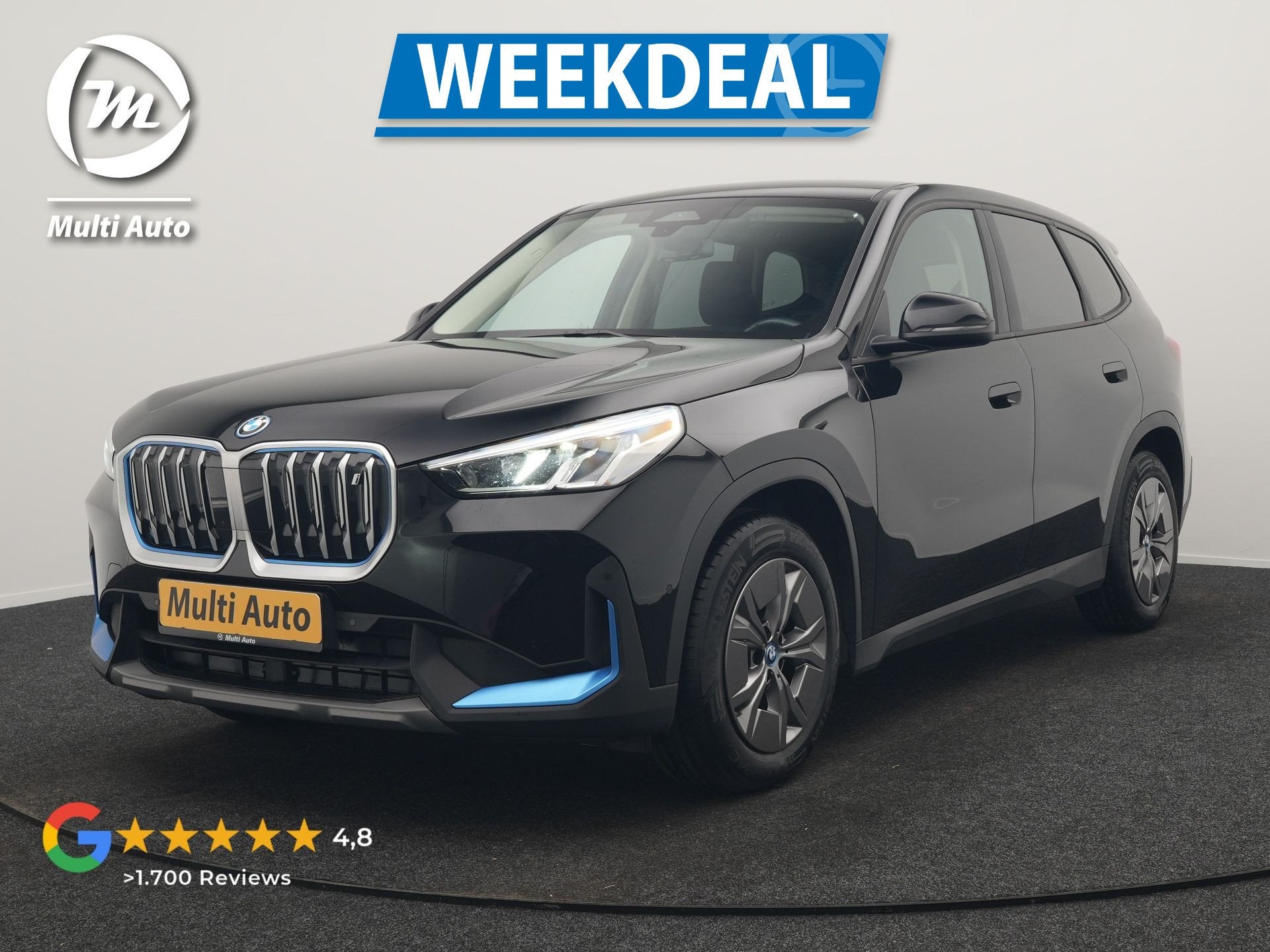 BMW iX1 xDrive30 67 kWh 313pk Dealer O.H. | Adaptief M Onder, Auto's, Automaat, Automatische klimaatregeling, Stof, Gebruikt