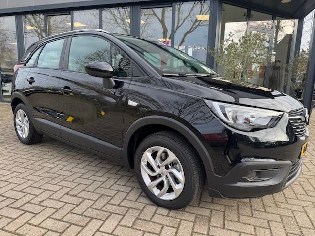 Opel Crossland X 1.2 Turbo Edition Airco | Trekhaak |, Auto's, Gebruikt, Euro 6, 1199 cc, Zwart