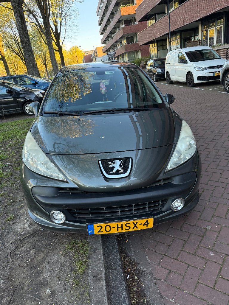 Peugeot 207 1.4 VTI 16V 5DRS 2009 Grijs, Auto's, Peugeot, Particulier, Airbags, Airconditioning, Automatische klimaatregeling
