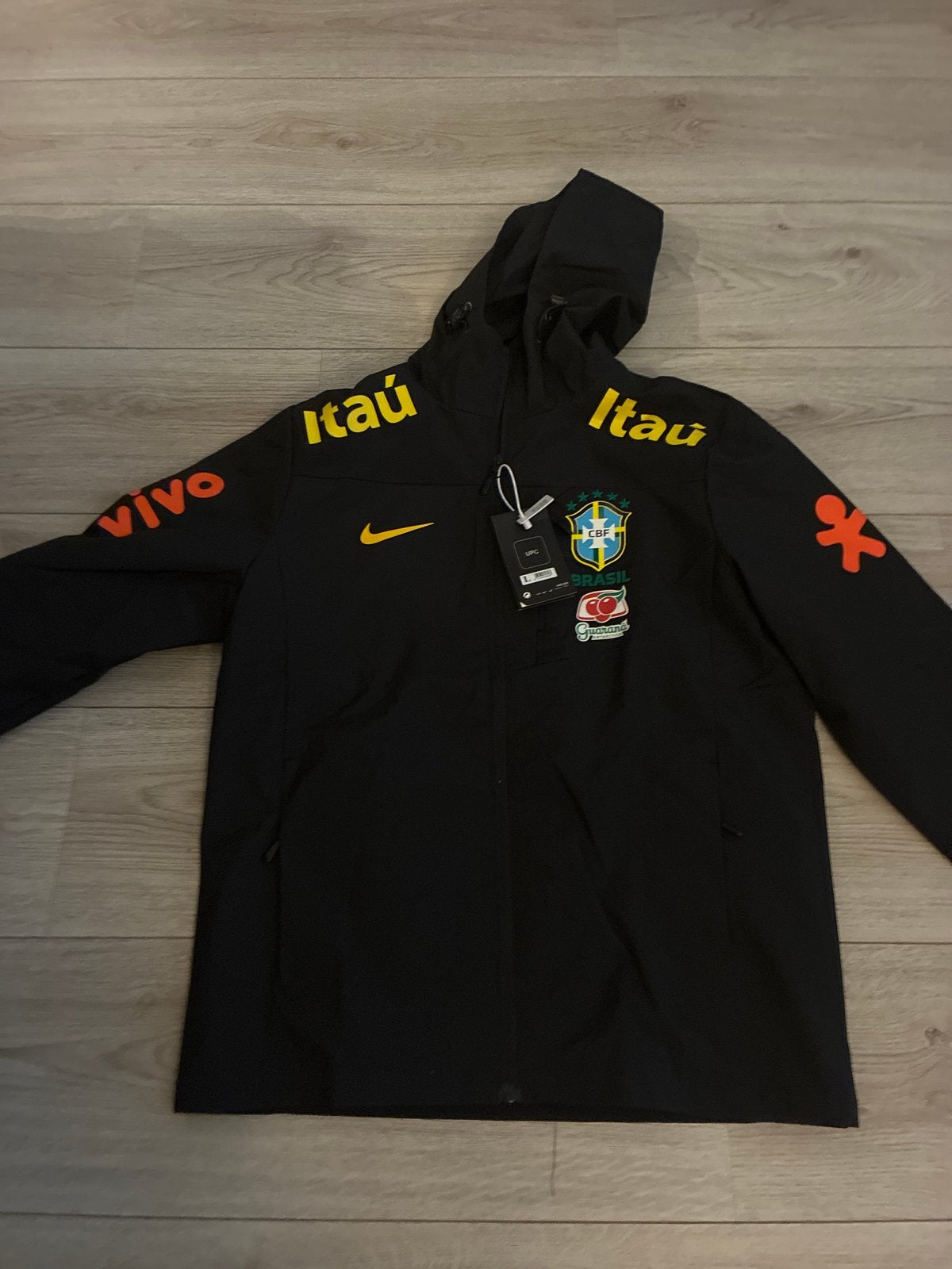 Nike Brazilië Regenjas - Maat L - Nieuw met labels, Ophalen, Nieuw