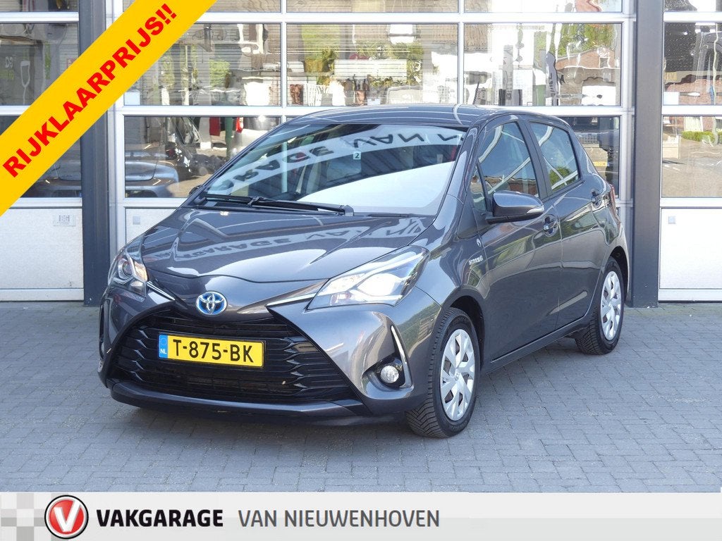 Toyota Yaris 1.5 Hybrid Dynamic *t/m 10de bouwjaar garantie!, Auto's, 4 cilinders, Met garantie (alle), Bedrijf, Hybride Elektrisch/Benzine