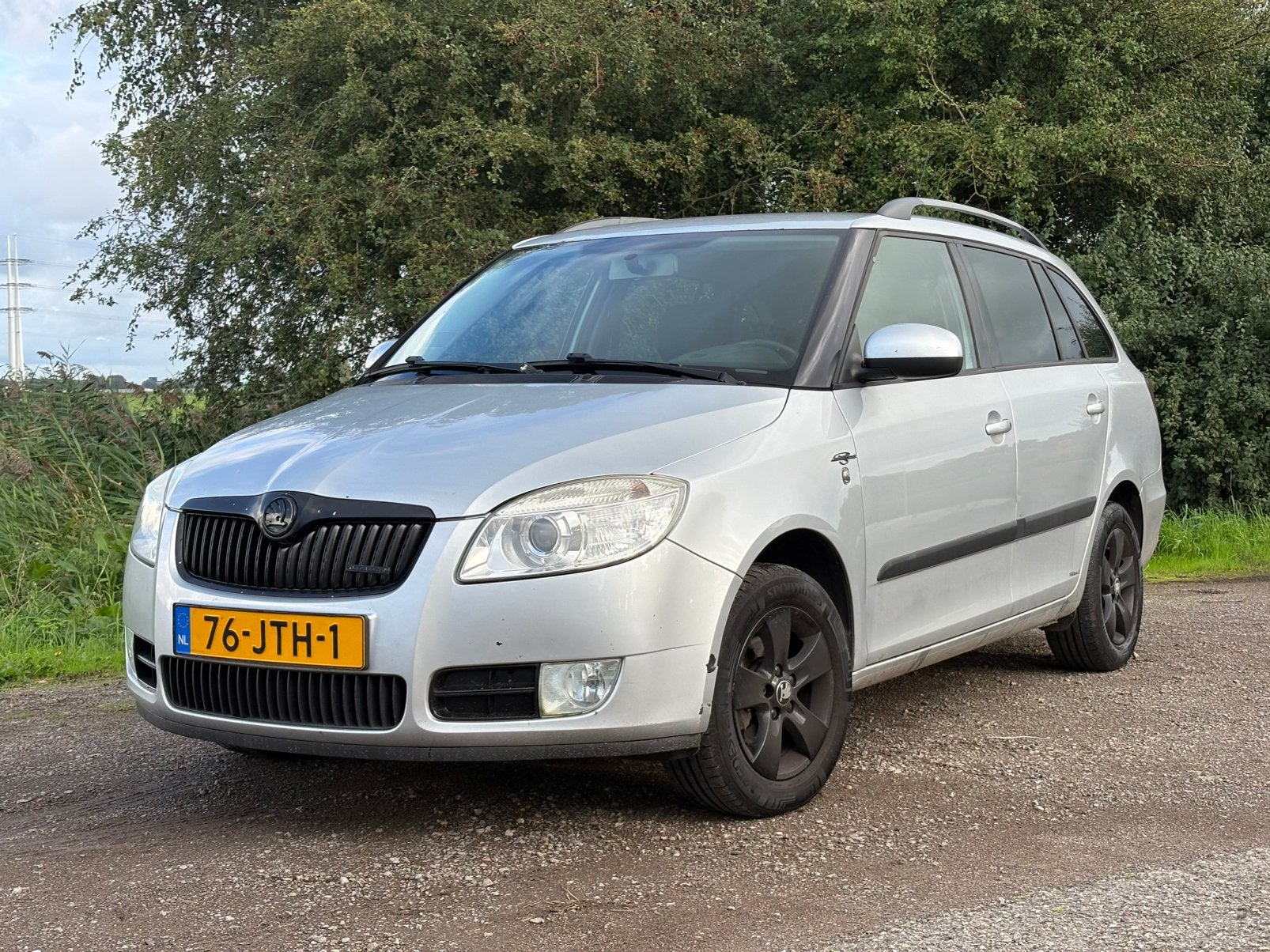 Skoda Fabia 1.6 16V 77KW Combi 2009 Grijs, Auto's, Voorwielaandrijving, Electronic Stability Program (ESP), Zwart, 4 cilinders