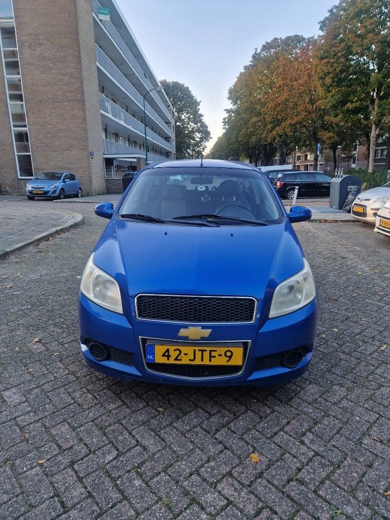 Chevrolet Aveo 1.4 16V 3D 2009 Blauw, Auto's, Voorwielaandrijving, Euro 5, Stof, 40 €/maand