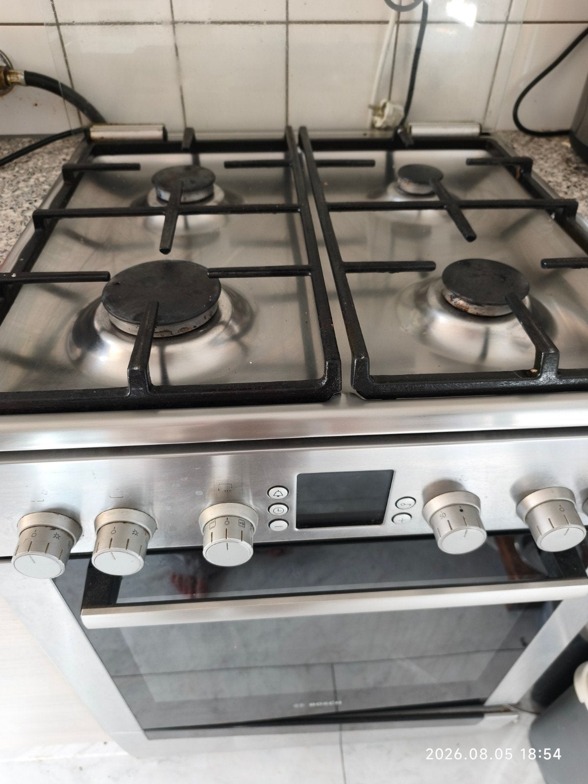 Bosch Vrijstaand Gasfornuis met Oven - RVS, Ophalen, Gebruikt, Minder dan 85 cm, 4 kookzones