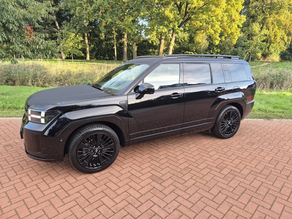 Hyundai Santa Fe BLACK LINE 1.6 T-gdi PHEV 252pk Aut 4WD 5p., Auto's, Automaat, Dealer onderhouden, Santa Fe, 4 cilinders