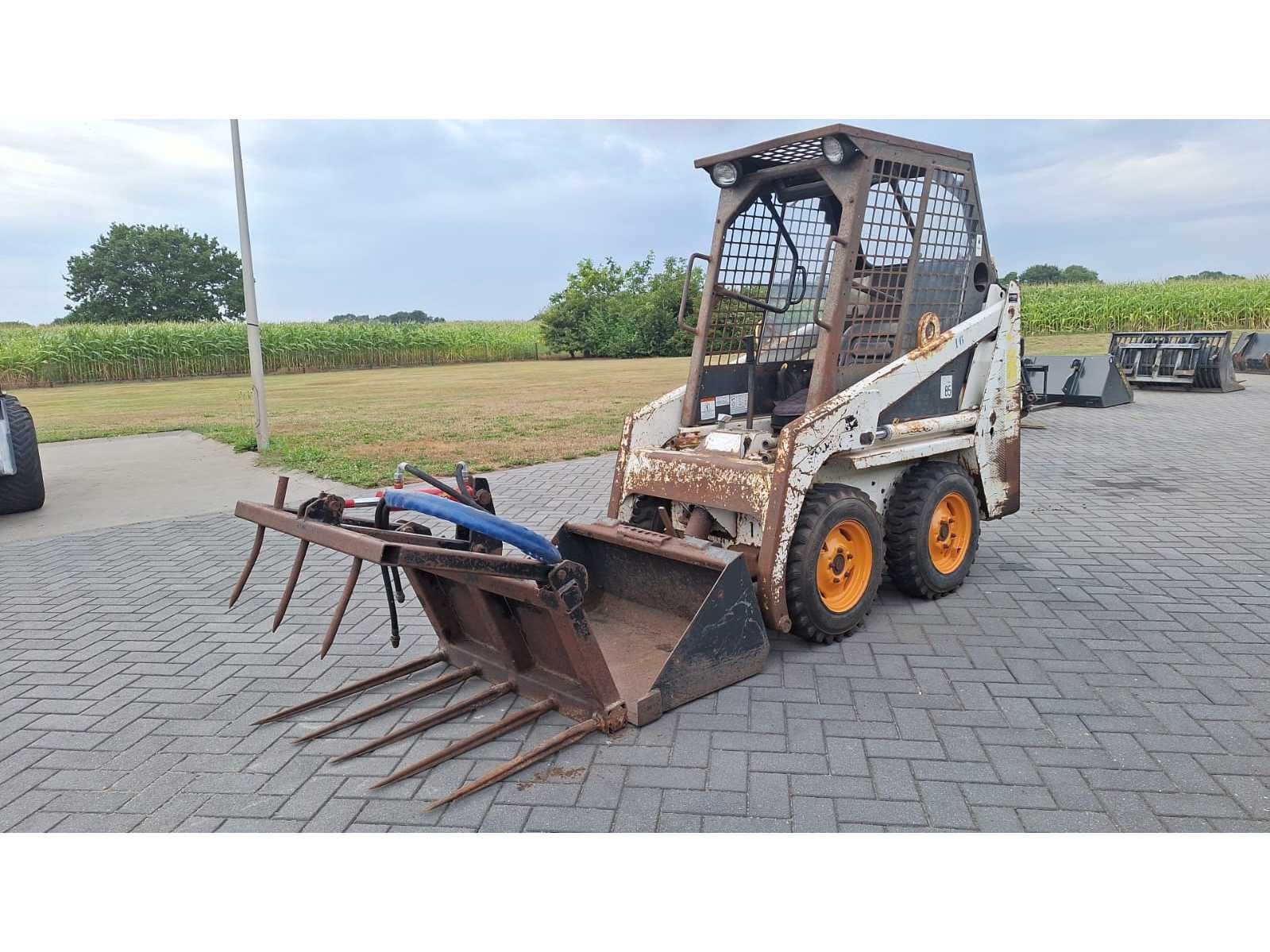 Bobcat 443 Schranklader, Wiellader of Shovel