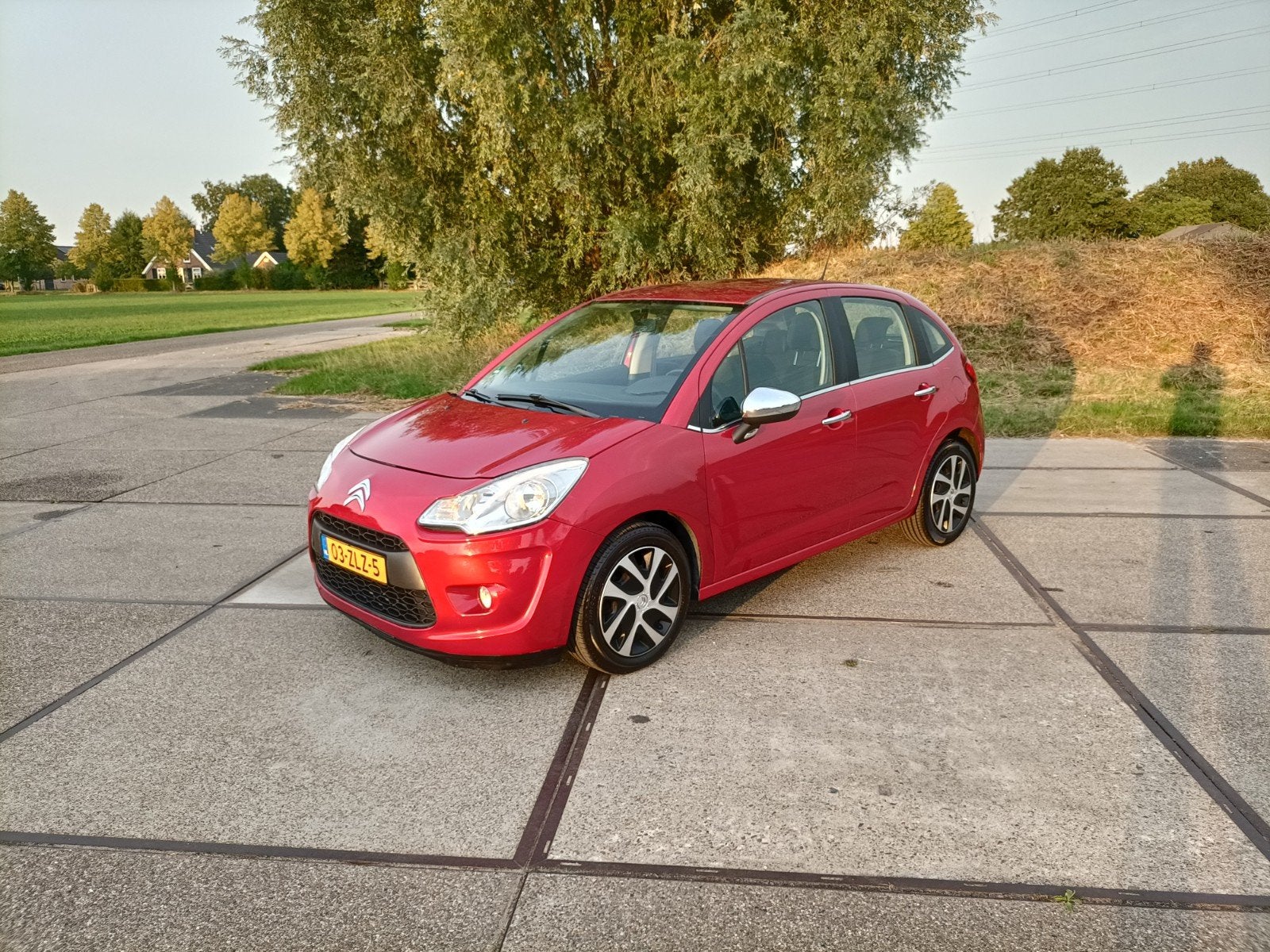 Citroën C3 1.2 VTI 60KW/82PK 2013 Rood, Voorwielaandrijving, Stof, 40 €/maand, 1199 cc
