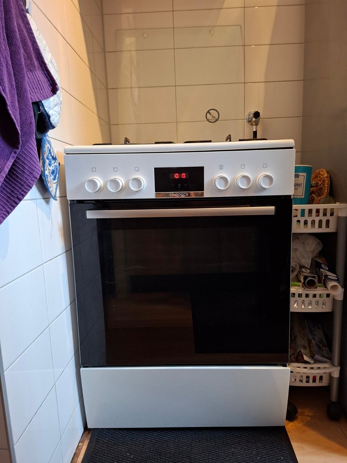 Bosch gasfornuis met elektrische oven  - netjes onderhouden, Ophalen, 4 kookzones, Zo goed als nieuw, Gas