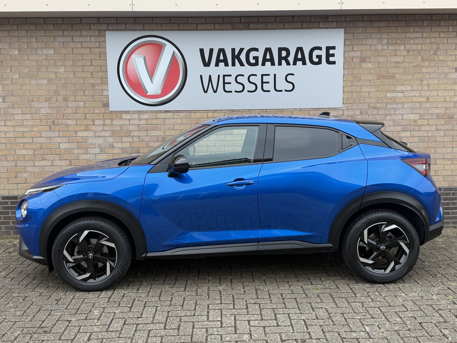 Nissan Juke 1.0 DIG-T N-Connecta Automaat | LM | PDC | Camer, Auto's, 12 maanden, Blauw, Automatische klimaatregeling, Origineel Nederlands