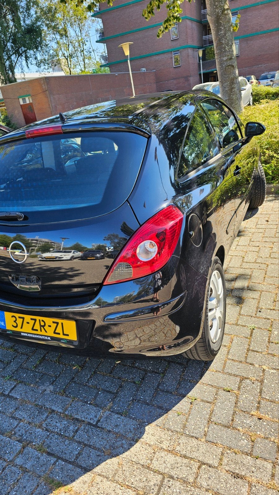 Opel Corsa 1.2 16V 3D WR 2007 Zwart, Auto's, Opel, Voorwielaandrijving, 450 kg, 40 €/maand, 4 cilinders