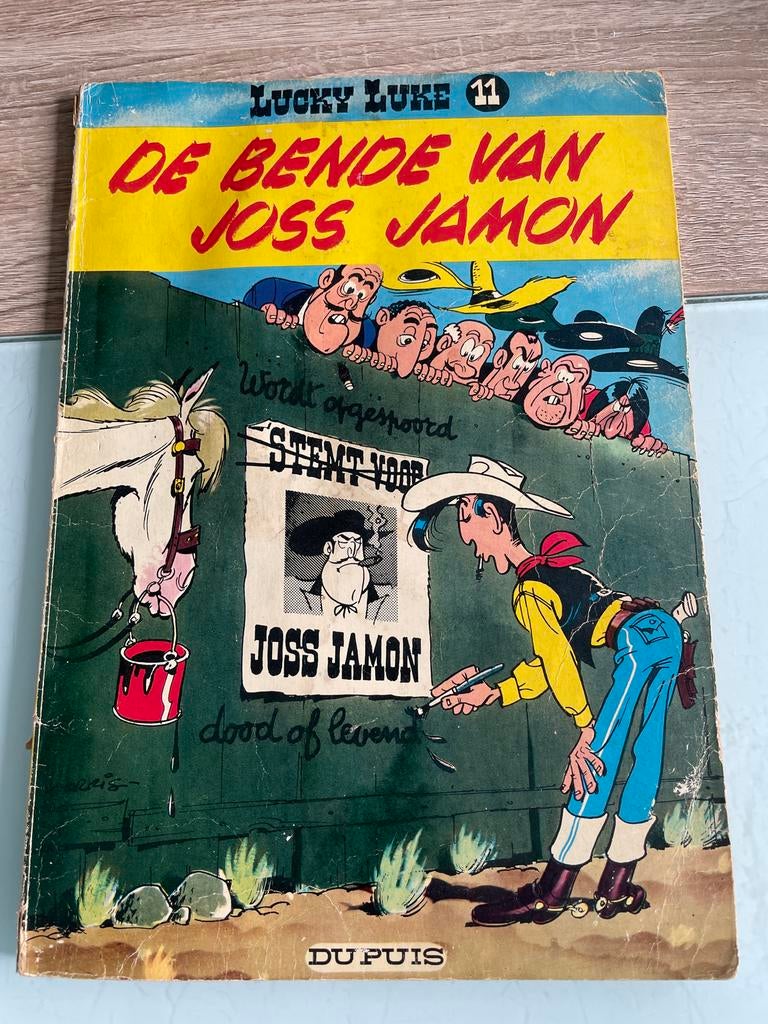 Lucky Luke 11 - De Bende van Joss Jamon (Oud stripboek), Boeken, Eén stripboek, Ophalen, Gelezen