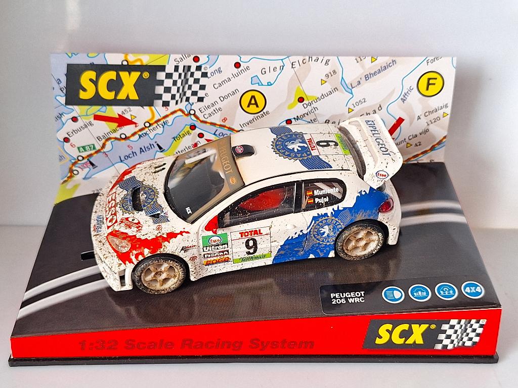 SCX 60510 PEUGEOT 206 WRC DIRT EFFECT, Overige merken, Racebaan, Scx, Nieuw