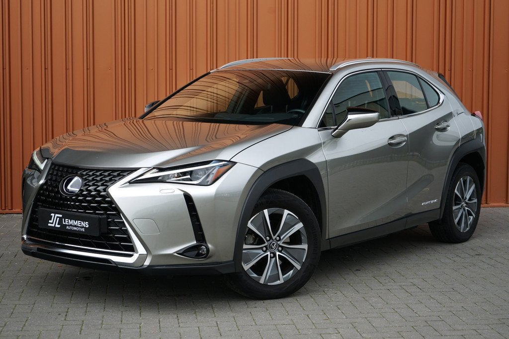 Lexus UX 300e Business 54kWh NL AUTO/GARANTIE El.stoelen ACC, Auto's, Lexus, Stof, Gebruikt, Parkeersensor, Origineel Nederlands