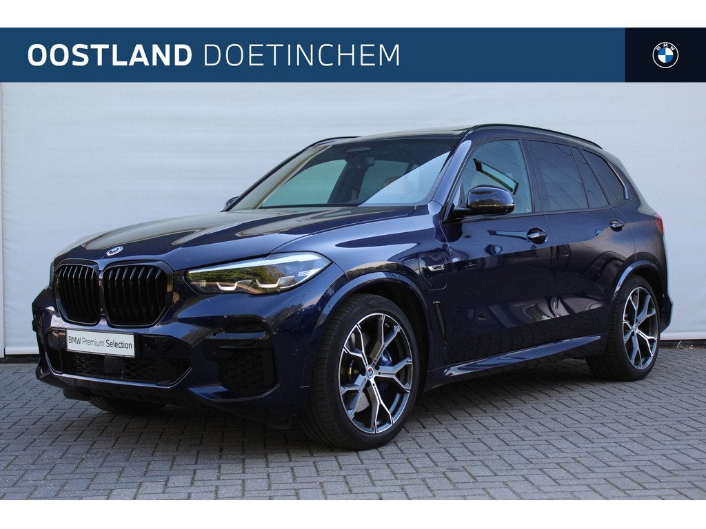BMW X5 xDrive45e High Executive M Sport Automaat / Trekhaak, Auto's, BMW, Gebruikt, 394 pk, Met garantie (alle), Blauw