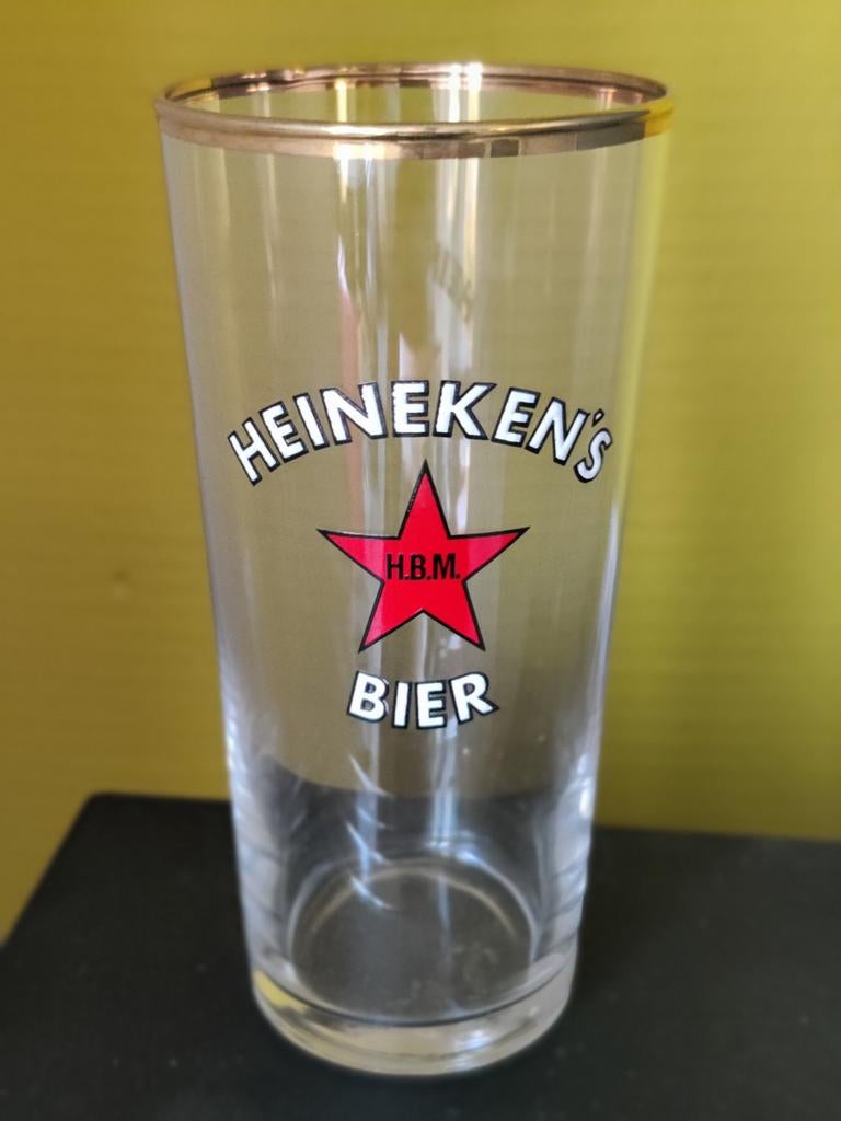 Te koop: Oud Heineken glas met H.B.M. logo, Ophalen of Verzenden, Zo goed als nieuw, Glas of Glazen, Heineken