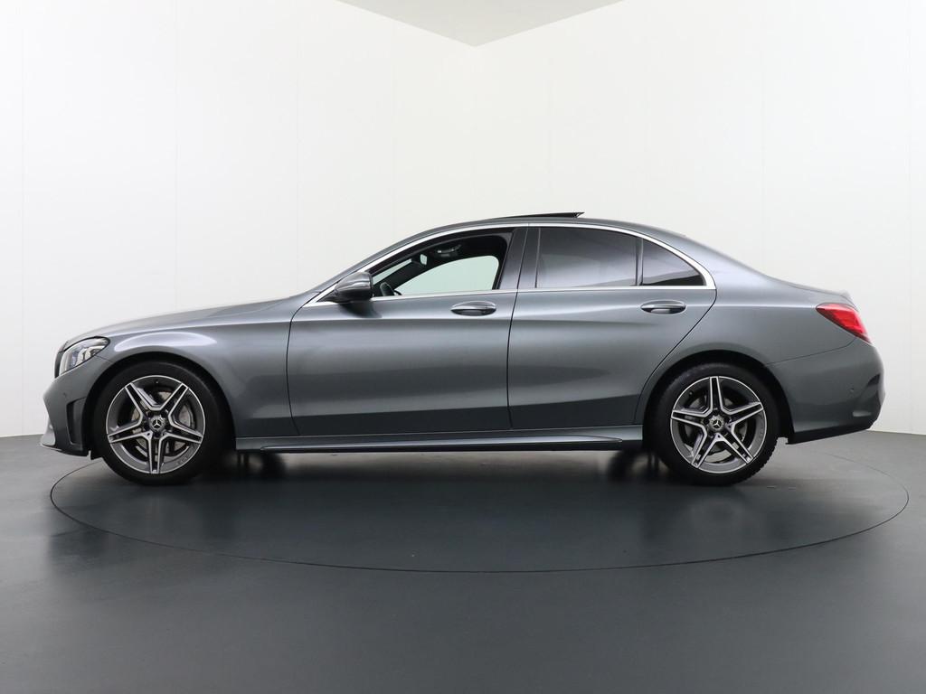 Mercedes-Benz C-klasse 180 AMG Business Solution | Panorama, Auto's, Mercedes-Benz, Automaat, Parkeerassistent, Leder en Stof