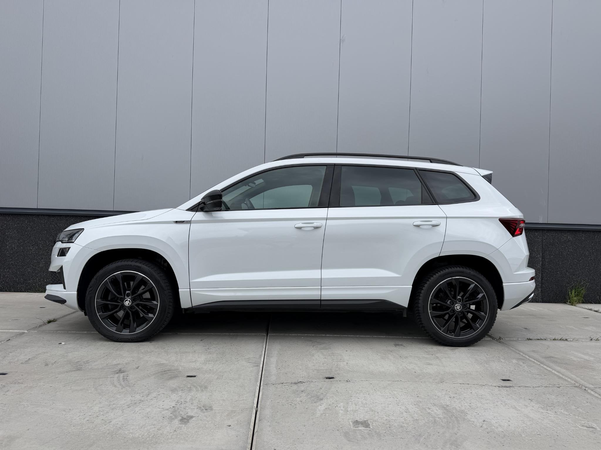 Skoda Karoq 1.5 TSI 150pk DSG Sportline Business | Adaptieve, Stof, 4 cilinders, Karoq, Bedrijf