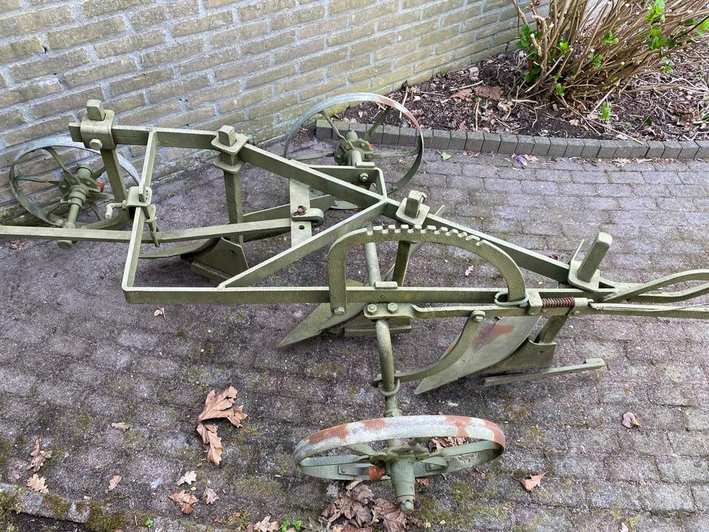 Ploeg met drie scharen, Ophalen