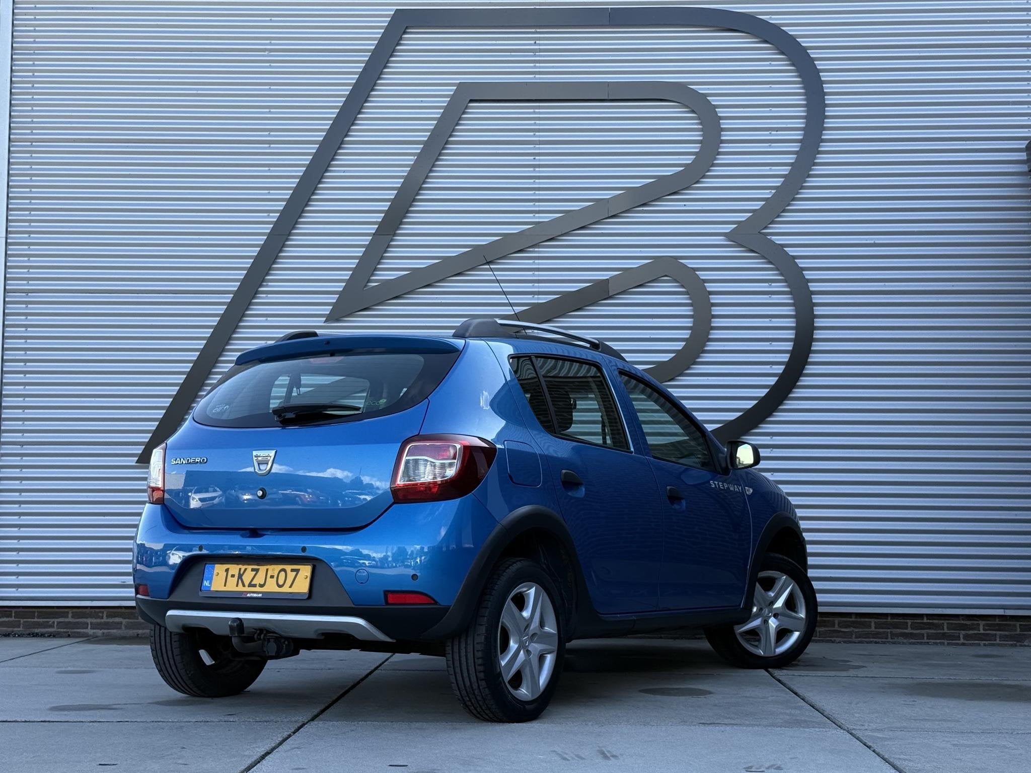 Dacia Sandero 0.9 TCe Stepway Lauréate Navi|Airco|Cruise|PD, Auto's, Voorwielaandrijving, Stof, Blauw, Origineel Nederlands