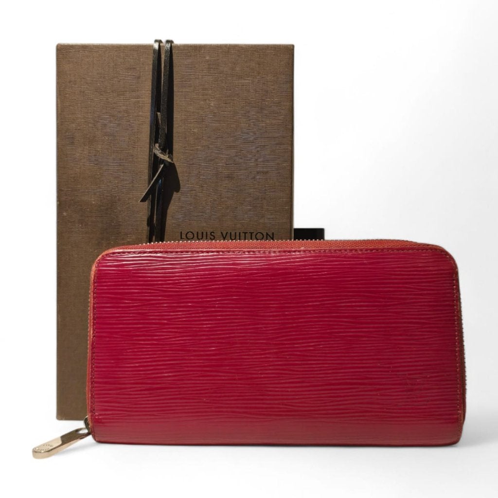 Louis Vuitton Red Epi Leather Zippy Wallet 2012, Louis Vuitton, Gebruikt, Support@louisvuitton.com, 2 Rue du Pont Neuf
75001 Paris
France