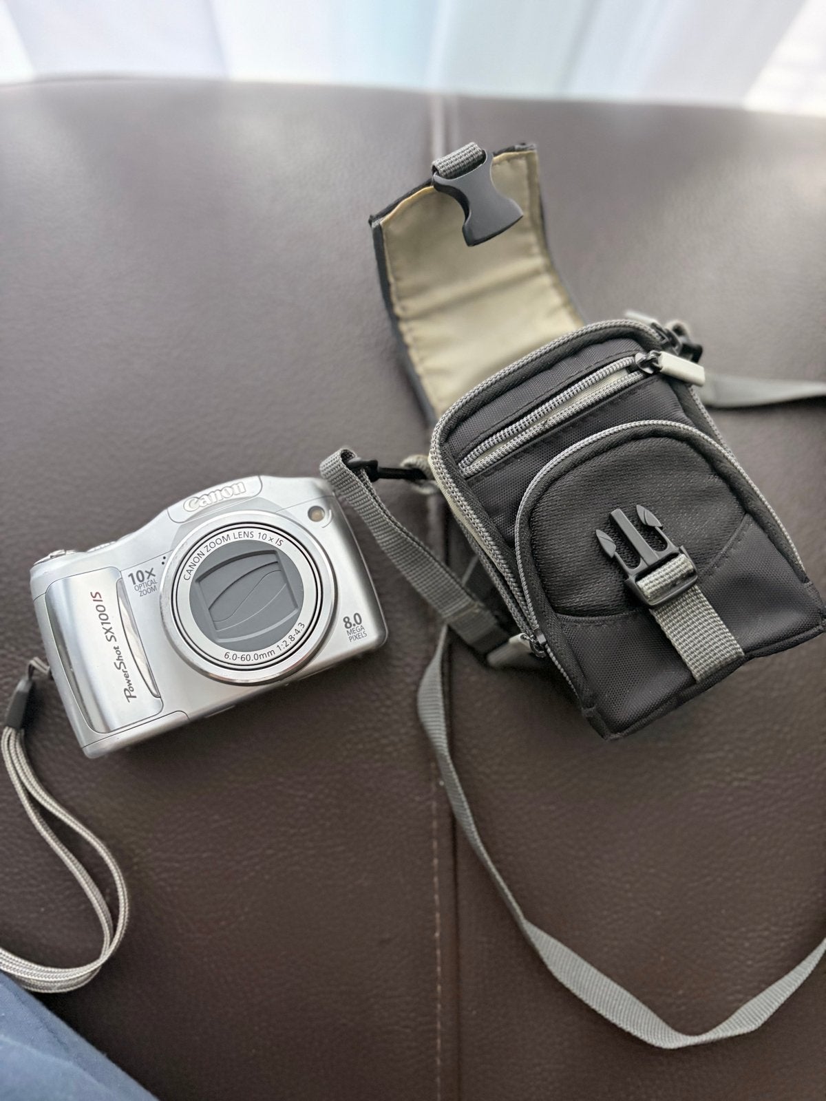 Canon PowerShot SX100 IS met hoesje, Ingebouwde flitser, Gebruikt, Canon, Ophalen of Verzenden