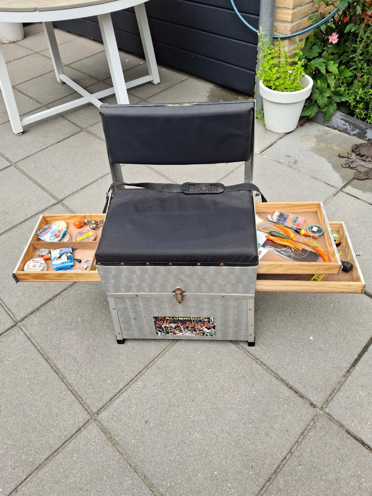 vissers stoel, Ophalen
