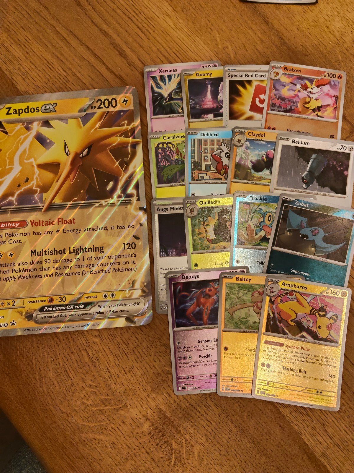 Pokémon set inclusief XL zapdos ex kaart, Ophalen of Verzenden, Zo goed als nieuw, Meerdere kaarten