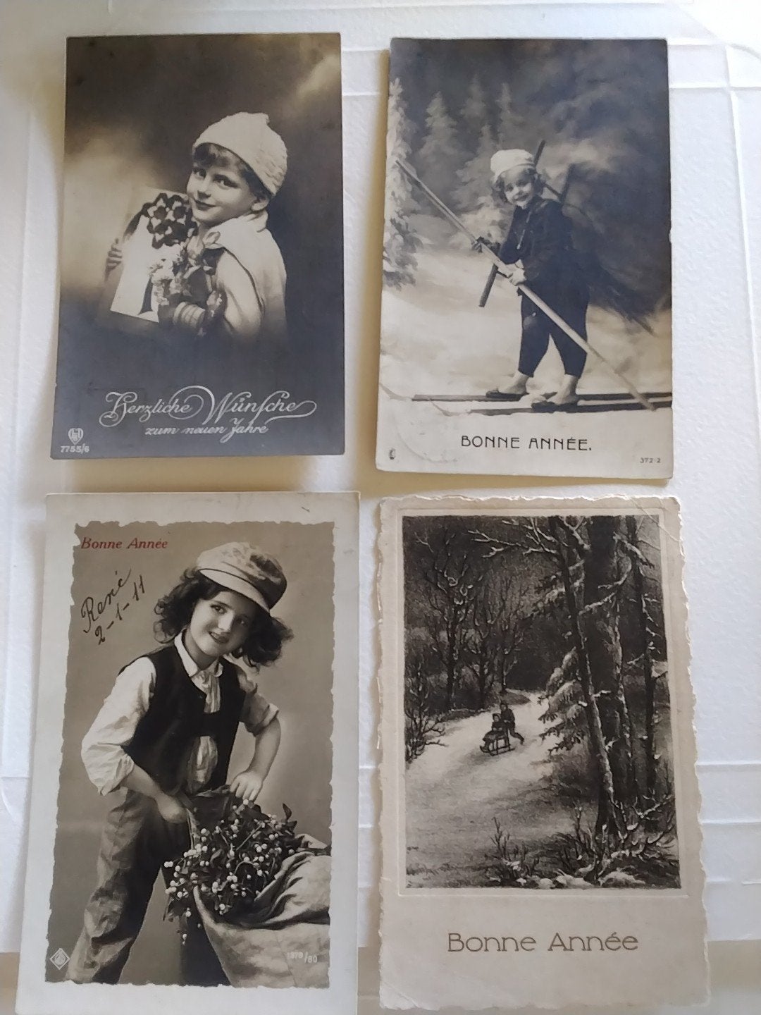 Set van 4 oude kerst- en nieuwjaarskaarten, Ophalen of Verzenden, Voor 1920, Gelopen, Overig Europa