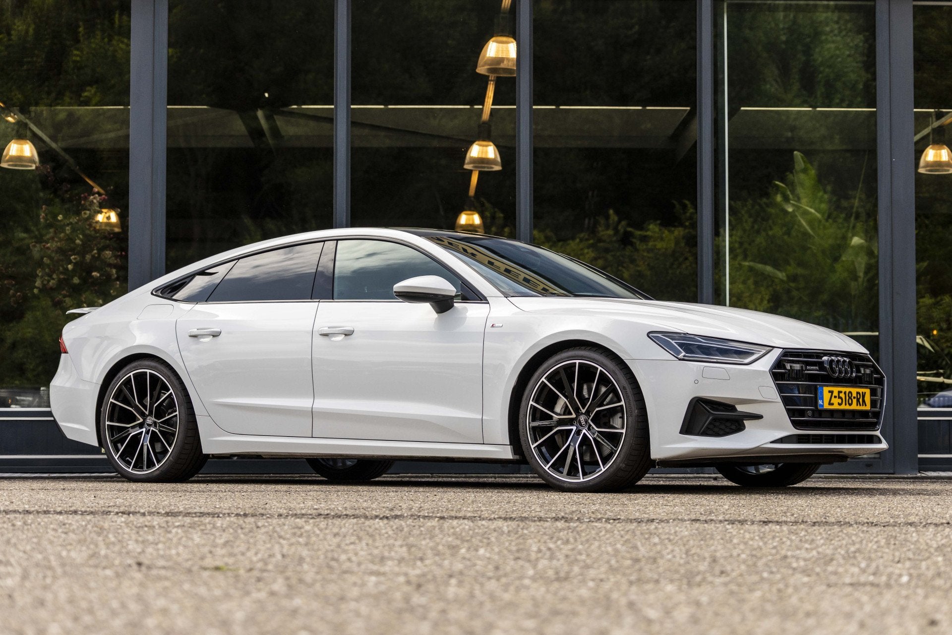 Audi A7 Sportback 50 TFSI e quattro Pro Line S (bj 2020), Auto's, Audi, Gebruikt, Euro 6, 4 stoelen, Wit