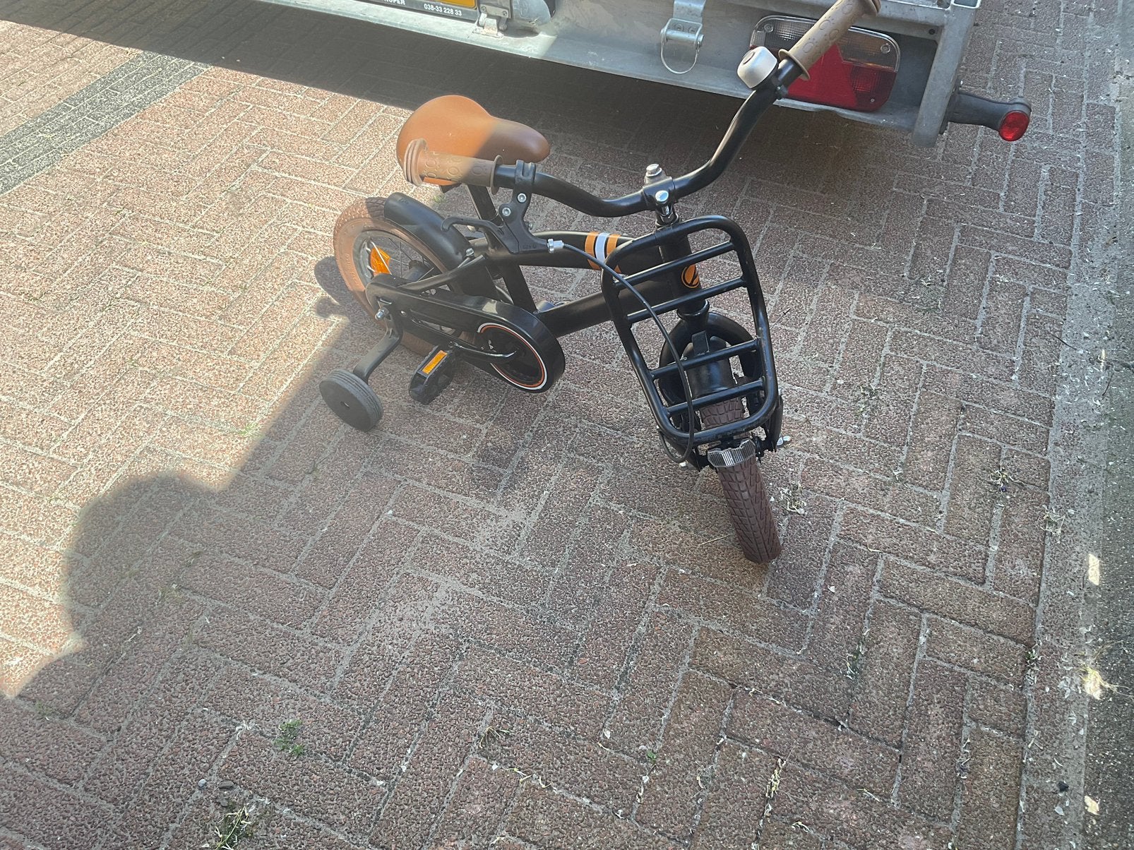 Kinderfiets 12 inch met zijwieltjes en voordrager, Zijwieltjes, Gebruikt, Velgrem, Ophalen of Verzenden