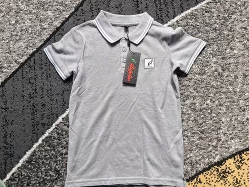 Grijze polo Maat 110-116 h3, Australian, Onbekend, Nieuw, Ophalen of Verzenden