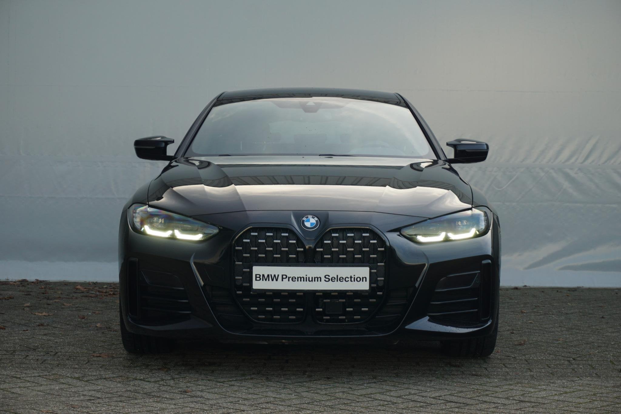 BMW 4 Serie Gran Coupé M440i xDrive M Sportpakket Pro 19'', Auto's, Met garantie (alle), Zwart, 374 pk, Bedrijf