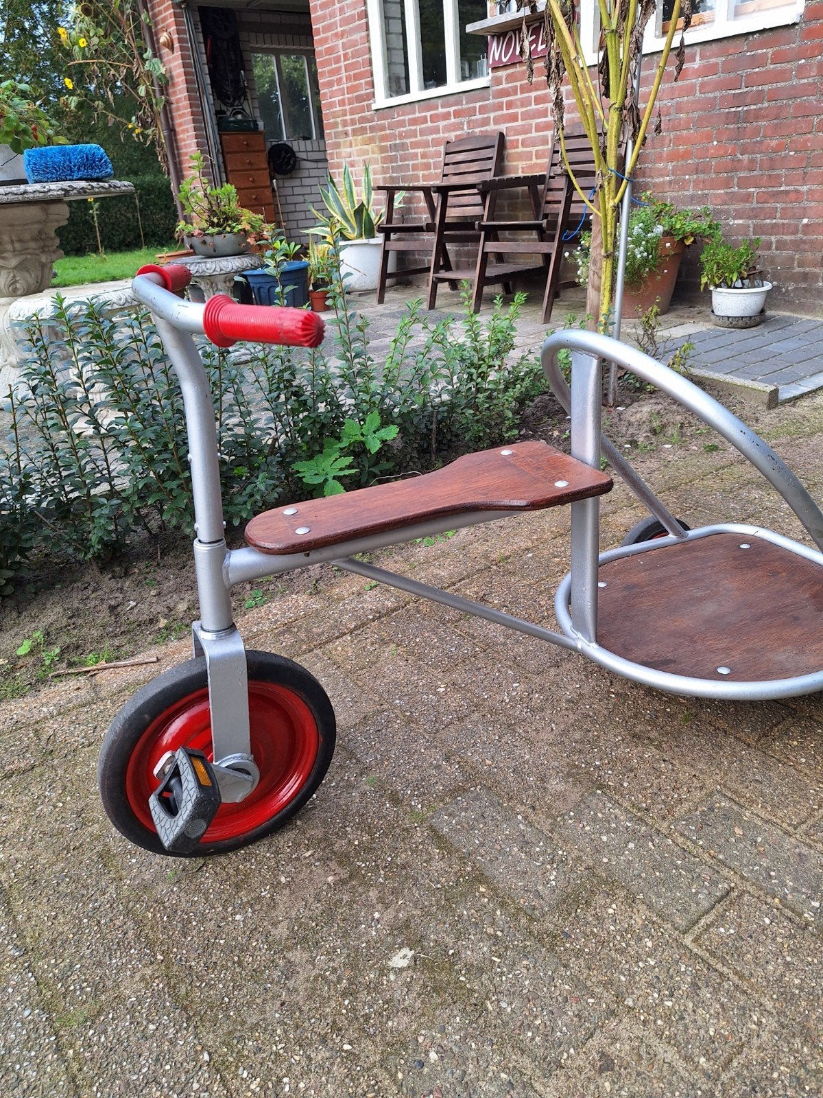 Speelgoed driewieler, Ophalen