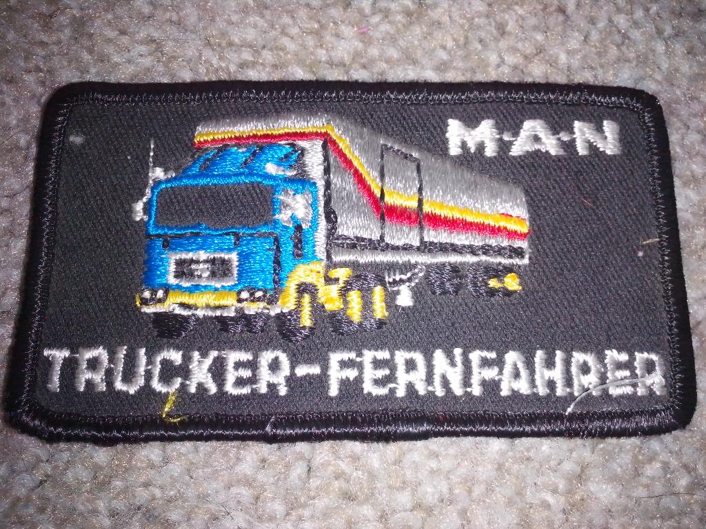 3x MAN 100 year + textielbadge + raceposter Antonio Albacete, Ophalen of Verzenden, Zo goed als nieuw, Auto's