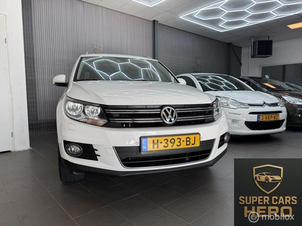 Volkswagen Tiguan 1.4 TSI Sport&Style, Auto's, Volkswagen, Voorwielaandrijving, Euro 5, 15 km/l, Gebruikt