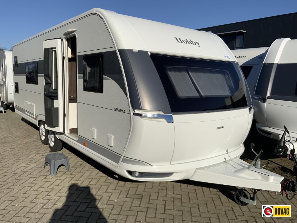 Hobby Prestige 650 KFU 2e Pinksterdag open, Caravans en Kamperen, Schokbreker, Rondzit, Bedrijf, 6 tot 7 meter