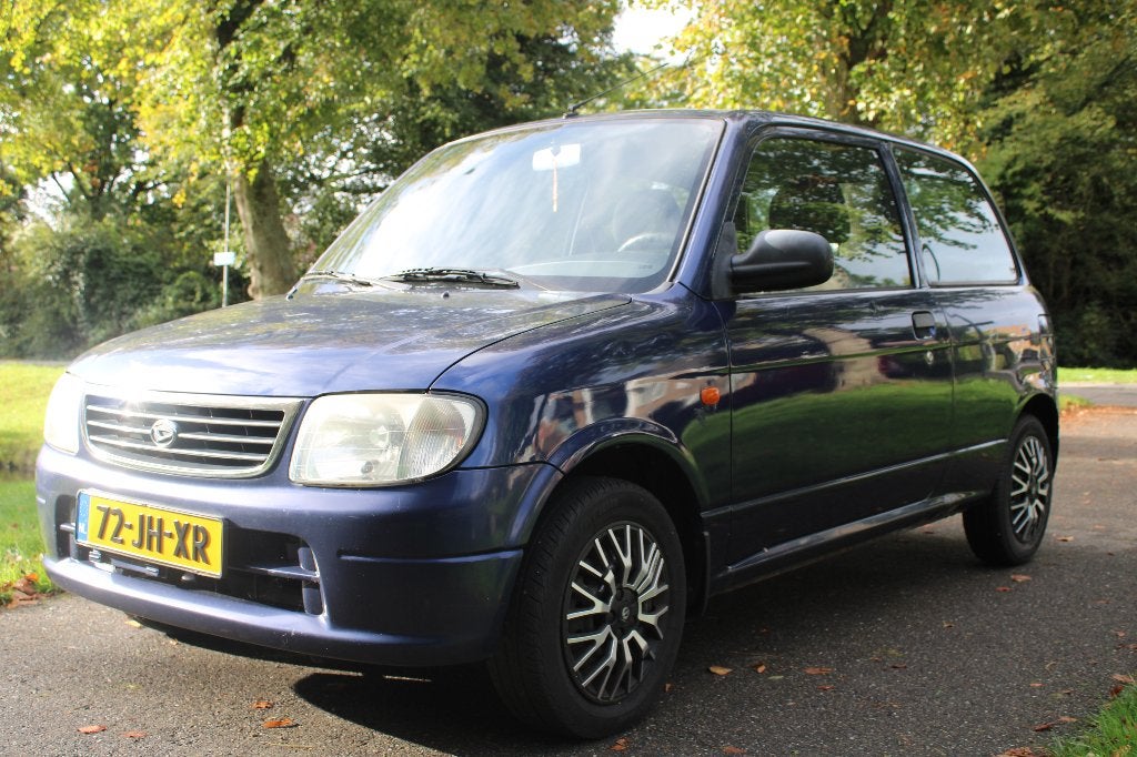 Daihatsu Cuore 1.0 AUTOMAAT 2002 Blauw, Auto's, 600 kg, Cuore, Origineel Nederlands, Grijs