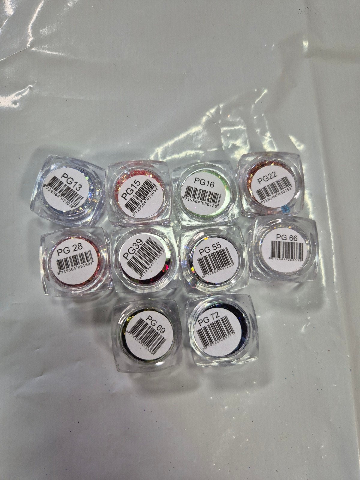 Nieuw 10x Urban Nails Pixie Glitters pakket 2, Overige kleuren, Nieuw, Ophalen of Verzenden, Handen en Nagels