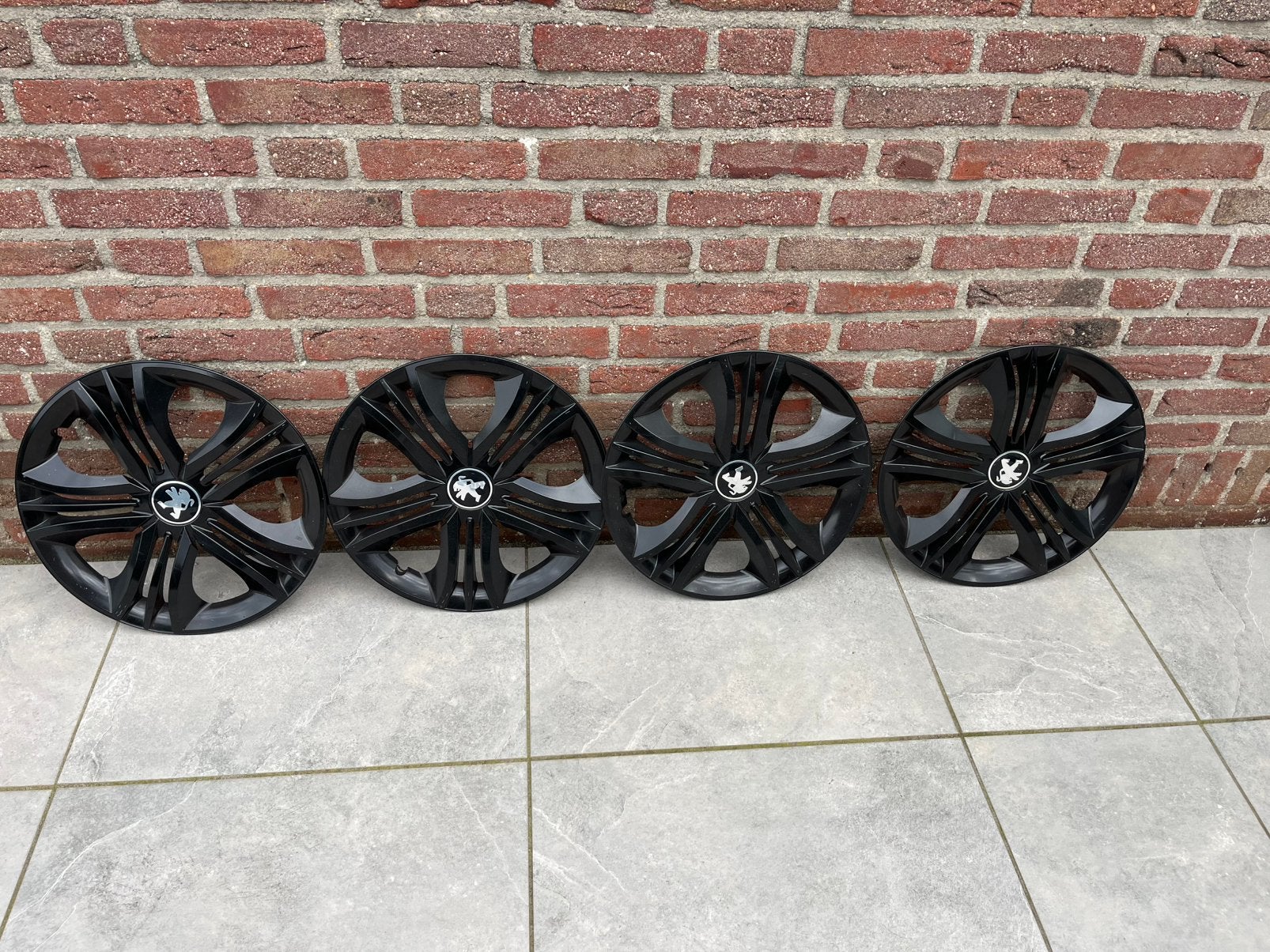 Wieldoppen 15” met Peugeot logo (4 stuks), Ophalen, Gebruikt