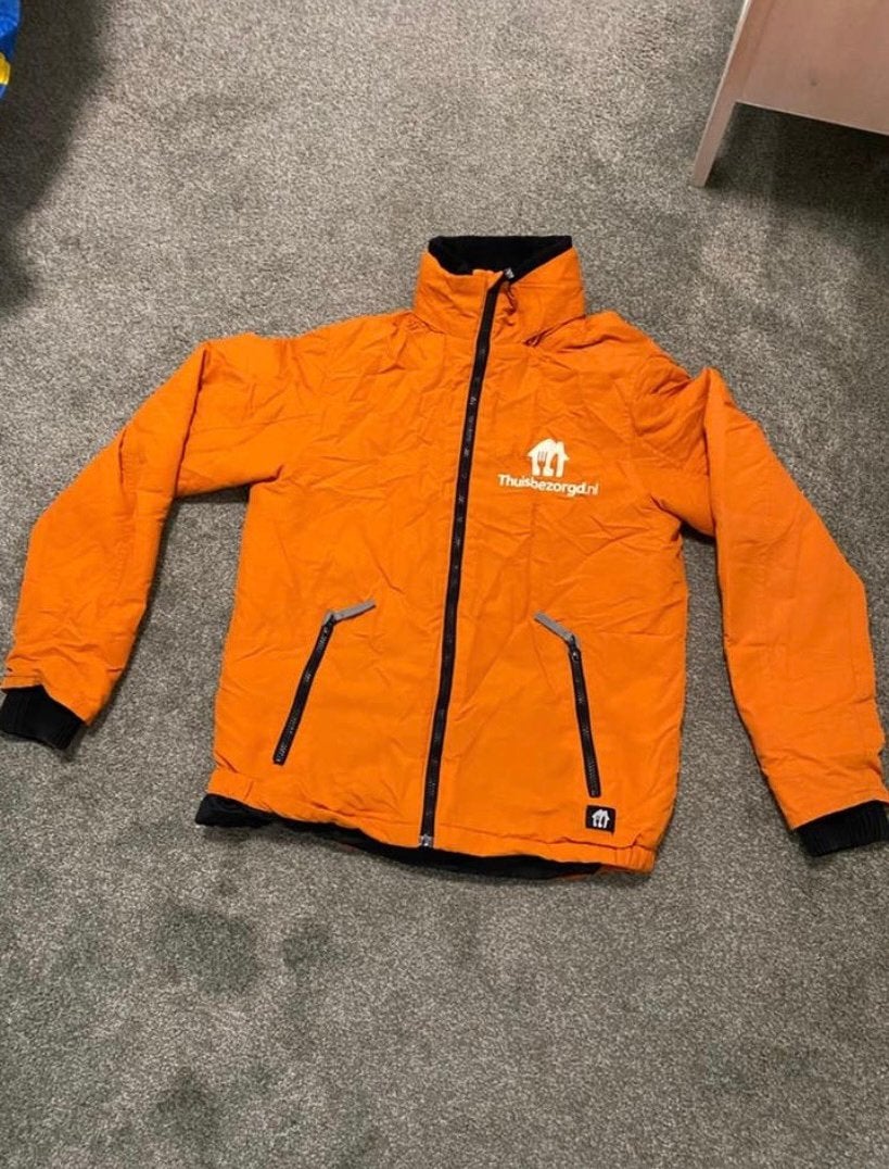 Thuisbezorgd jas maat S - Gebruikt, goede staat, Ophalen of Verzenden, Gedragen, Maat 46 (S) of kleiner, Oranje