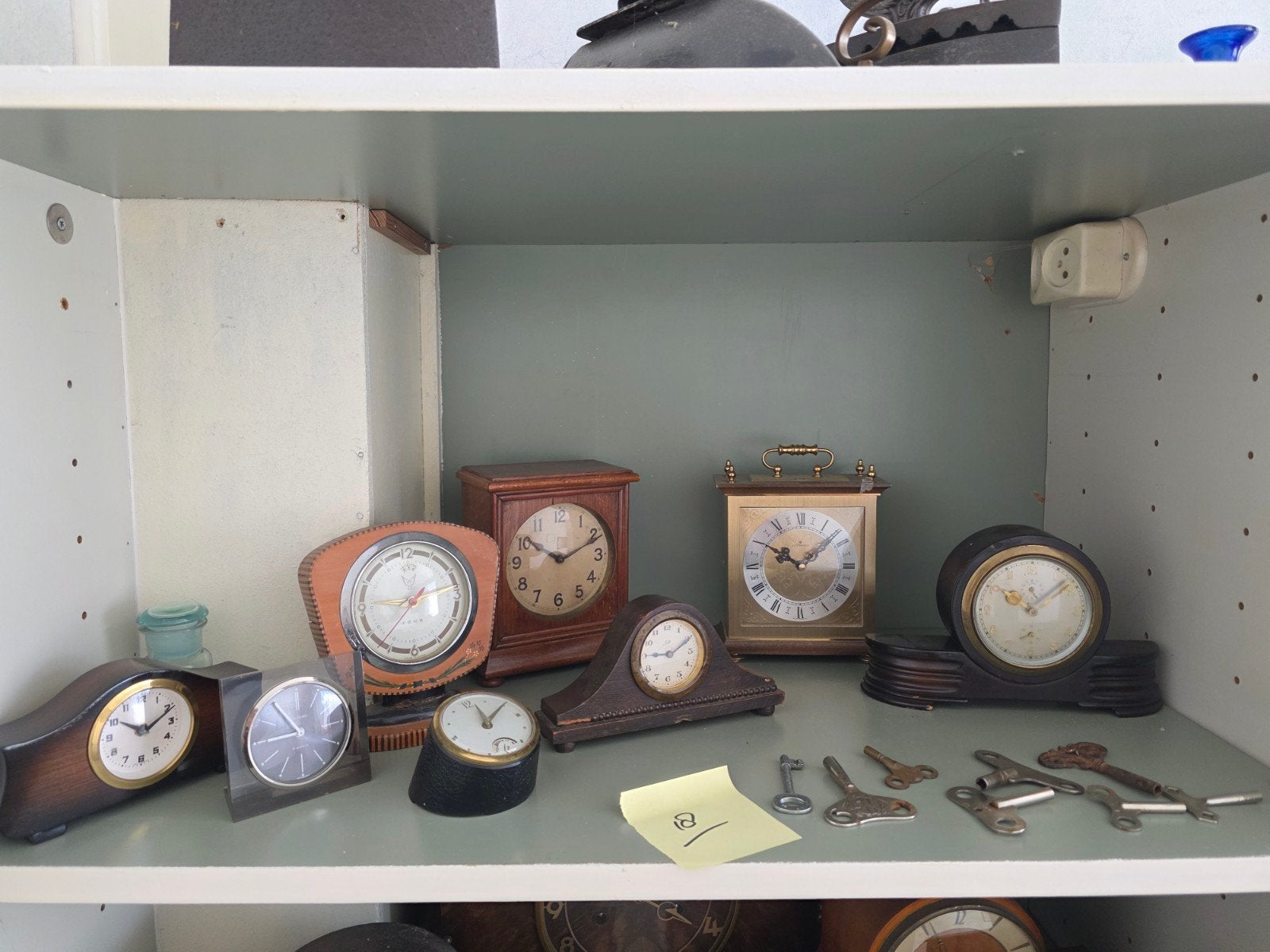 Diverse collectie antieke en vintage klokken, Ophalen