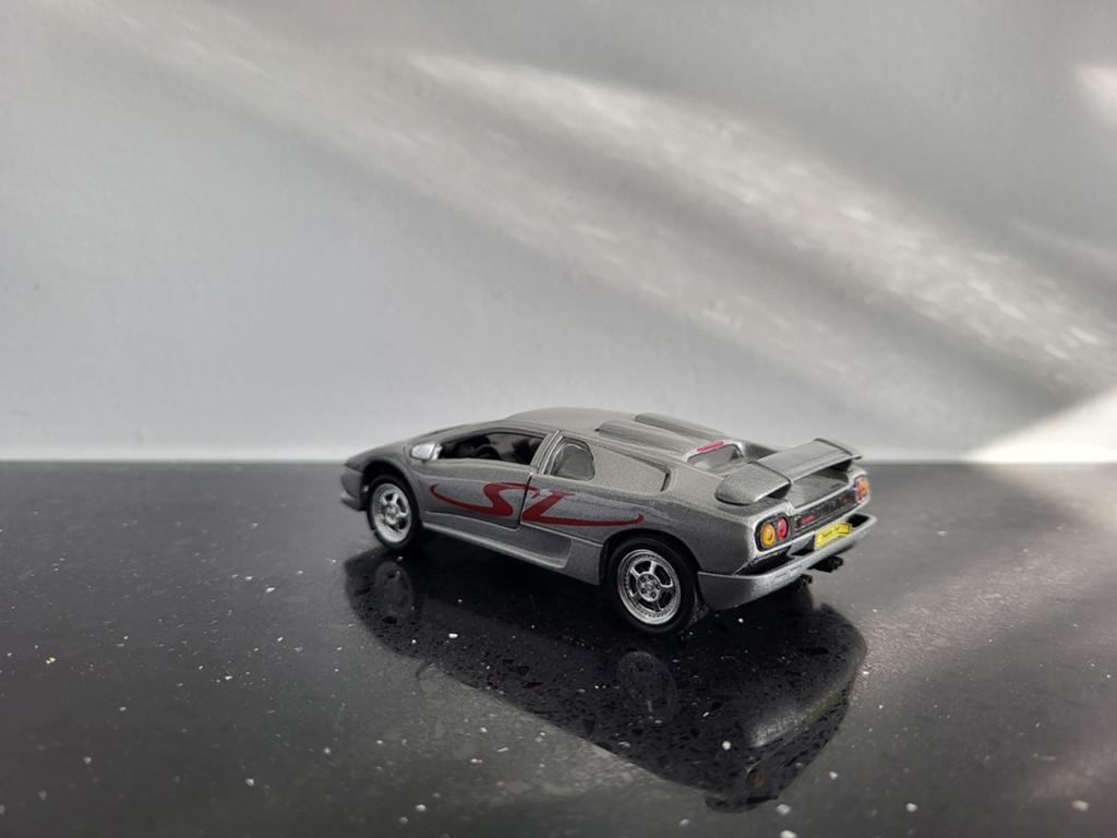 Lamborghini Diablo SV grijs 1/43 Welly, Hobby en Vrije tijd, Modelauto's | 1:43, Ophalen of Verzenden, Zo goed als nieuw, Auto
