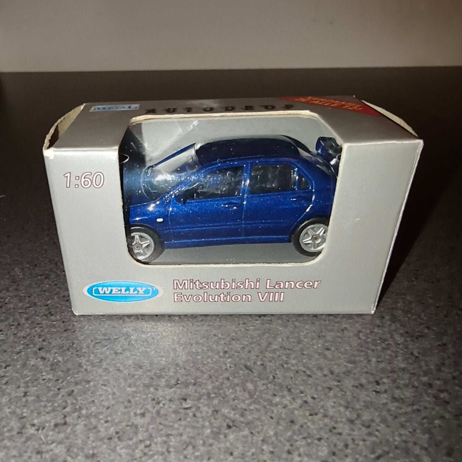 Welly Mitsubishi Lancer Evolution VIII modelauto 1:60, Ophalen of Verzenden, Nieuw, Overige typen