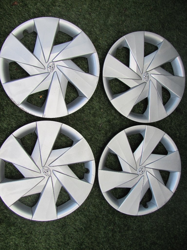 4x originele 15 inch Toyota wiledoppen, Auto diversen, Ophalen of Verzenden, Gebruikt