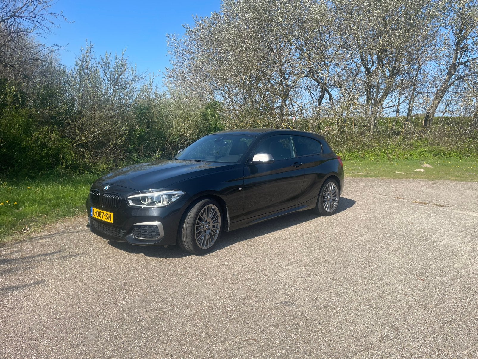BMW 1-Serie M135i 326pk Xdrive Aut 2015 Zwart, Auto's, 1490 kg, 4 stoelen, Zwart, Vierwielaandrijving