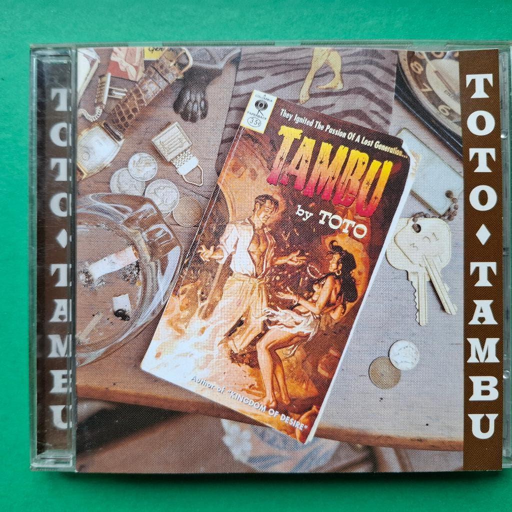 TOTO - TAMBU, Ophalen of Verzenden, Zo goed als nieuw, Overige genres