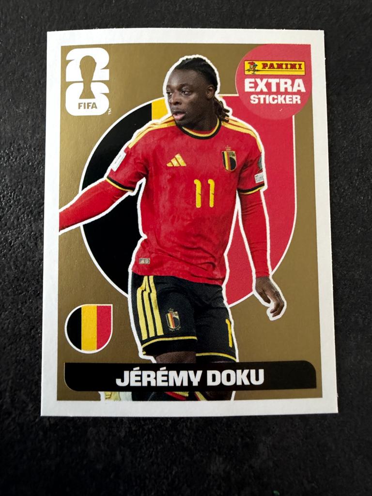Jeremy Doku Panini Extra Sticker Gold FIFA World Cup 2026, Ophalen of Verzenden, Nieuw, Buitenlandse clubs, Poster, Plaatje of Sticker