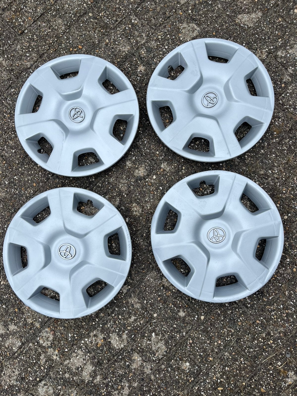 Toyota Yaris Aygo 14 inch set originele wieldoppen, Ophalen of Verzenden, Zo goed als nieuw