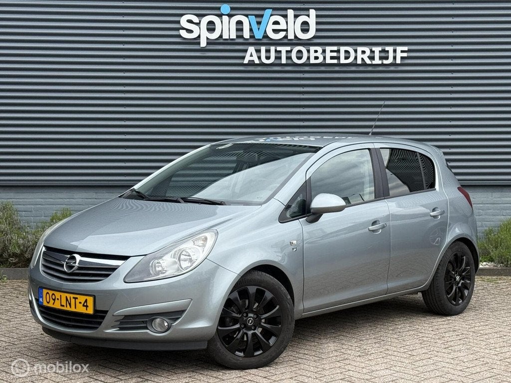 Opel Corsa 1.2-16V Cosmo - Airco - Cruise - Nap -, Voorwielaandrijving, Euro 5, Gebruikt, 4 cilinders